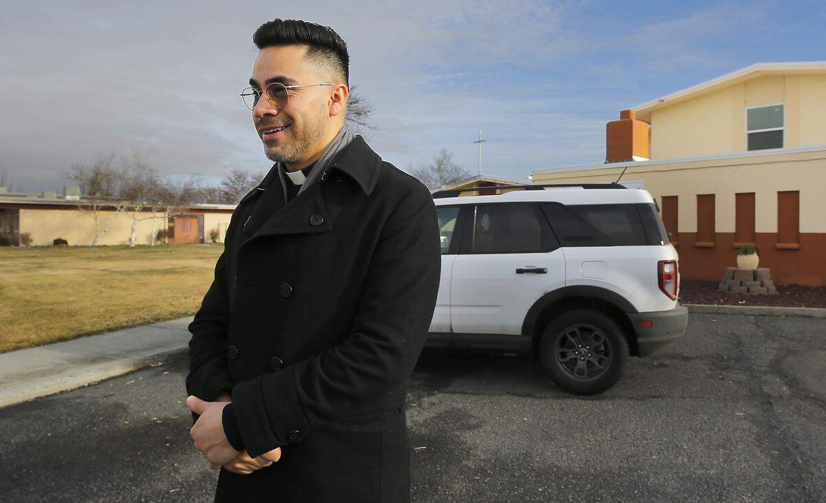 Rev. Cesar Izquierdo stands outside the chapel of the St. Rose of Lima Catholic Church in Ephrata.