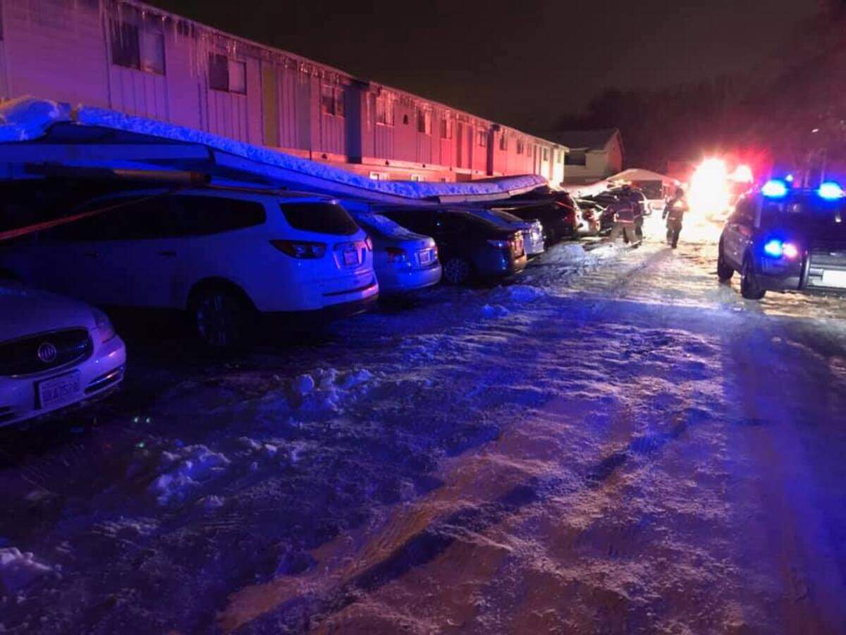 First responders arrive on the scene of Thursday night’s carport collapse at Phoenix Manor Apartments in Kennewick.