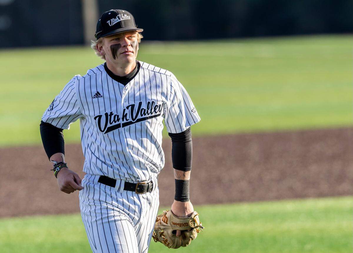 Danny Dickinson takes the field for Utah Valley University in Orem, Utah, in April 2023.