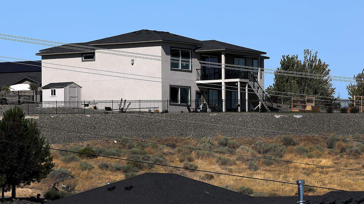 Police and federal agents arrested Shanna Lee Gardner at her house in West Richland.