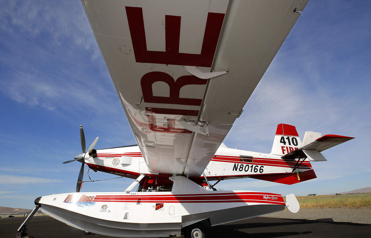 Lettering on the wing's underside of an Air Tractor single engine air tanker currently stationed during wildfire season at the Port of Benton's Richland Airport.