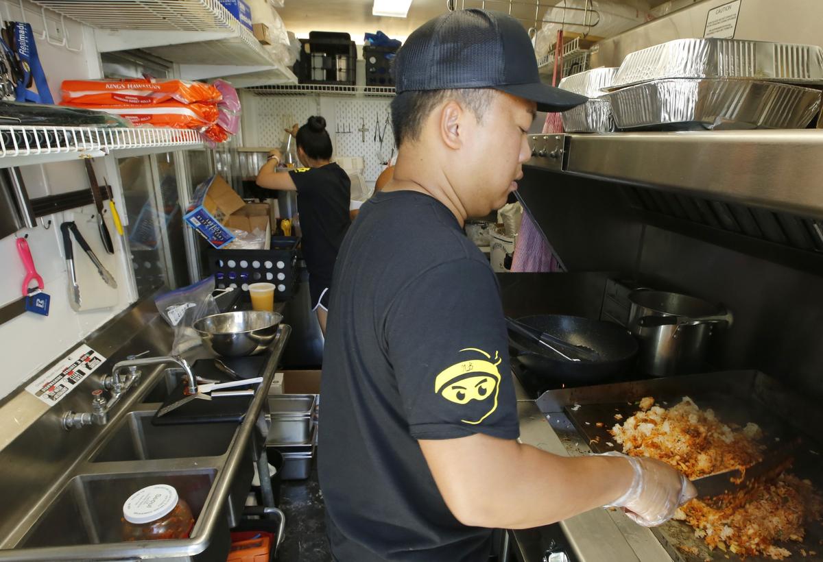 David Phongsa, a 2000 graduate of Pasco High School, opened Ninja Bistro food truck this week at John Dam Plaza in Richland. He's cooking a batch of his kimchi fried rice. Watch a video at: tricityherald.com/video