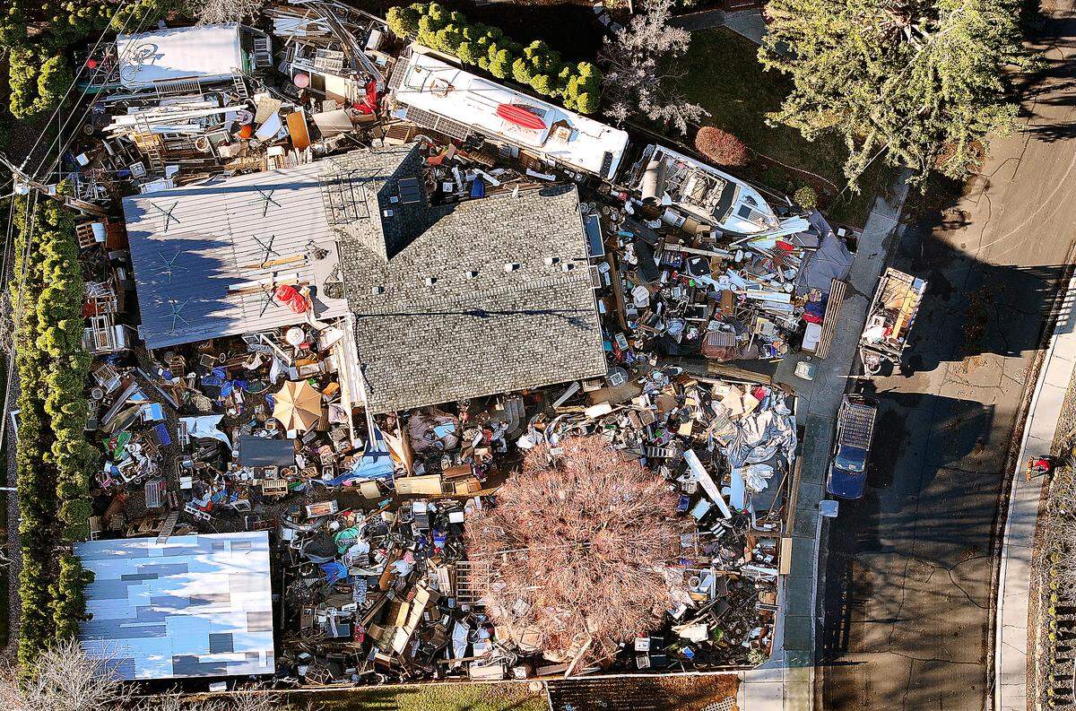 The garbage-clogged home at 1312 Hains Ave. in Richland sold at a foreclosure auction Friday at the Benton County Justice Center in Kennewick. 