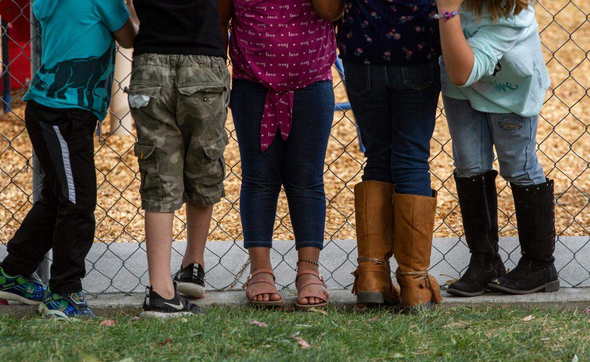 Children play outside during recreation time at Beyond the Rainbow Daycare in Kennewick. Childcare facilities are faced with new challenges with remote learning as students return to school during the ongoing coronavirus pandemic.