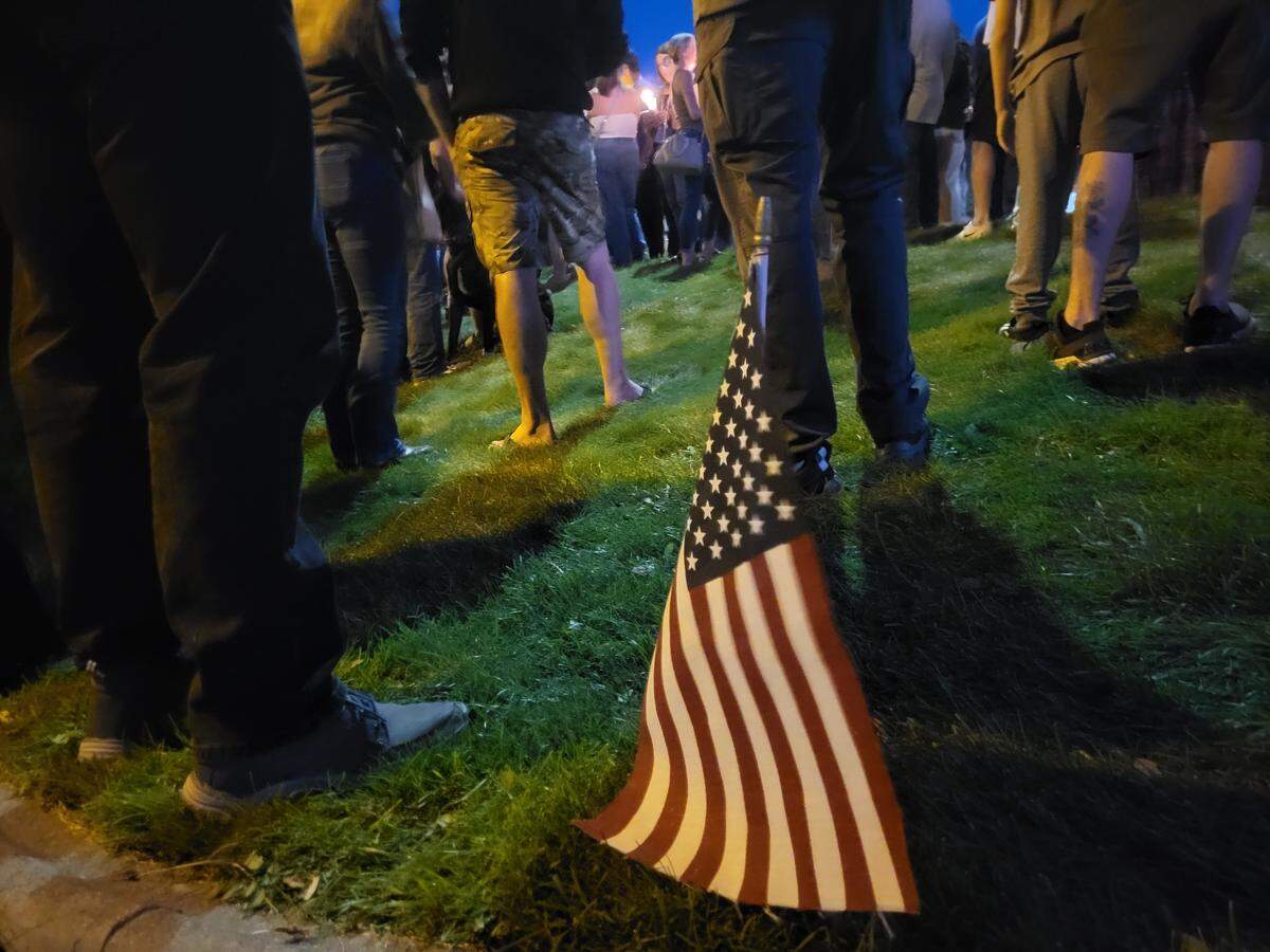 Hundreds of people gathered Saturday night in front of Sterling’s Restaurant on Queensgate Drive to have a candlelight vigil for conservative political influence Charlie Kirk.