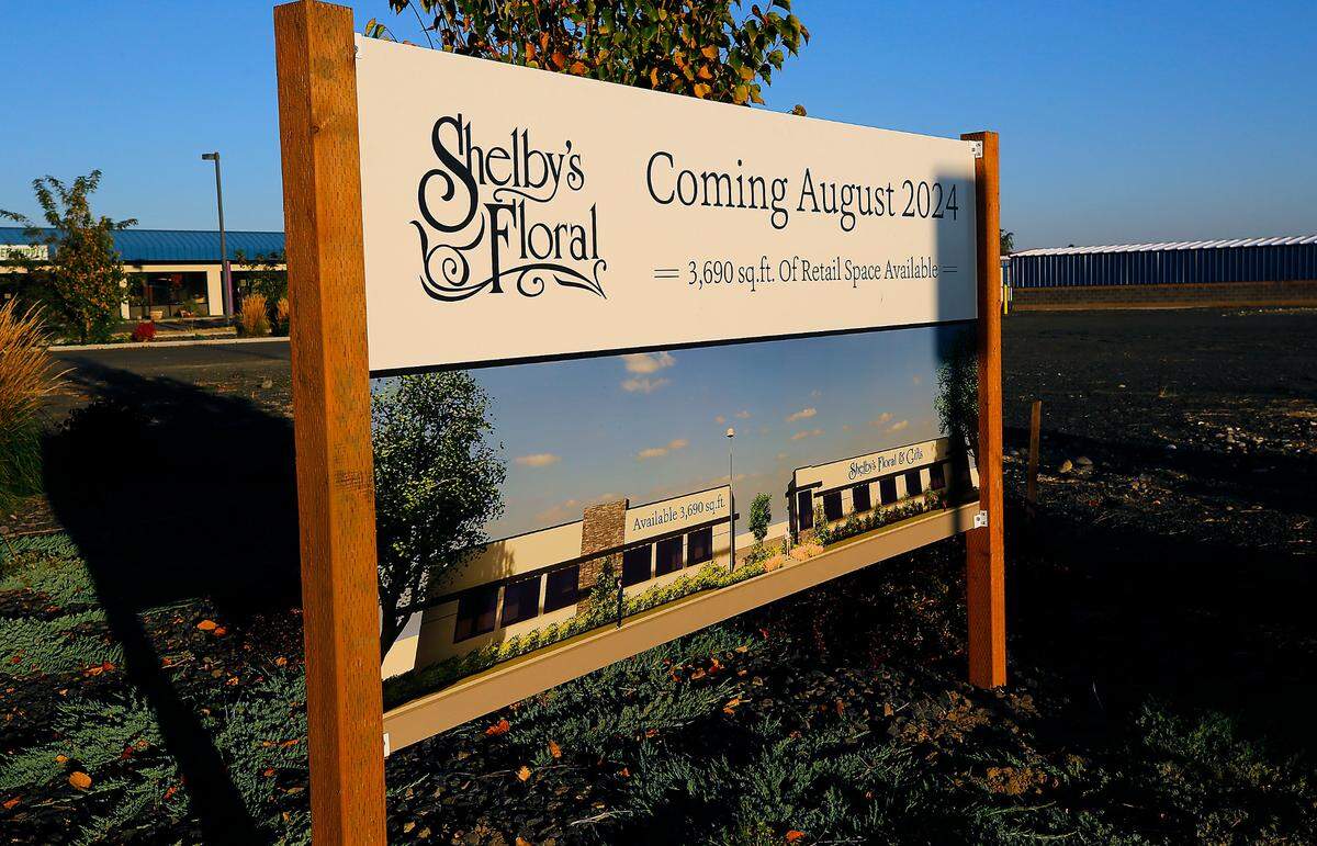 A sign isat 6018 W. Clearwater Ave. announces the new building for Shelby’s Floral and additional retail space available in mid- 2024.