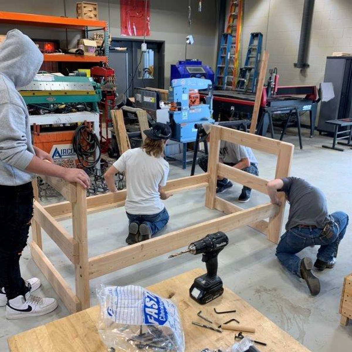 Finley High School students work on a bunk bed for a foster home as part of the FFA project.