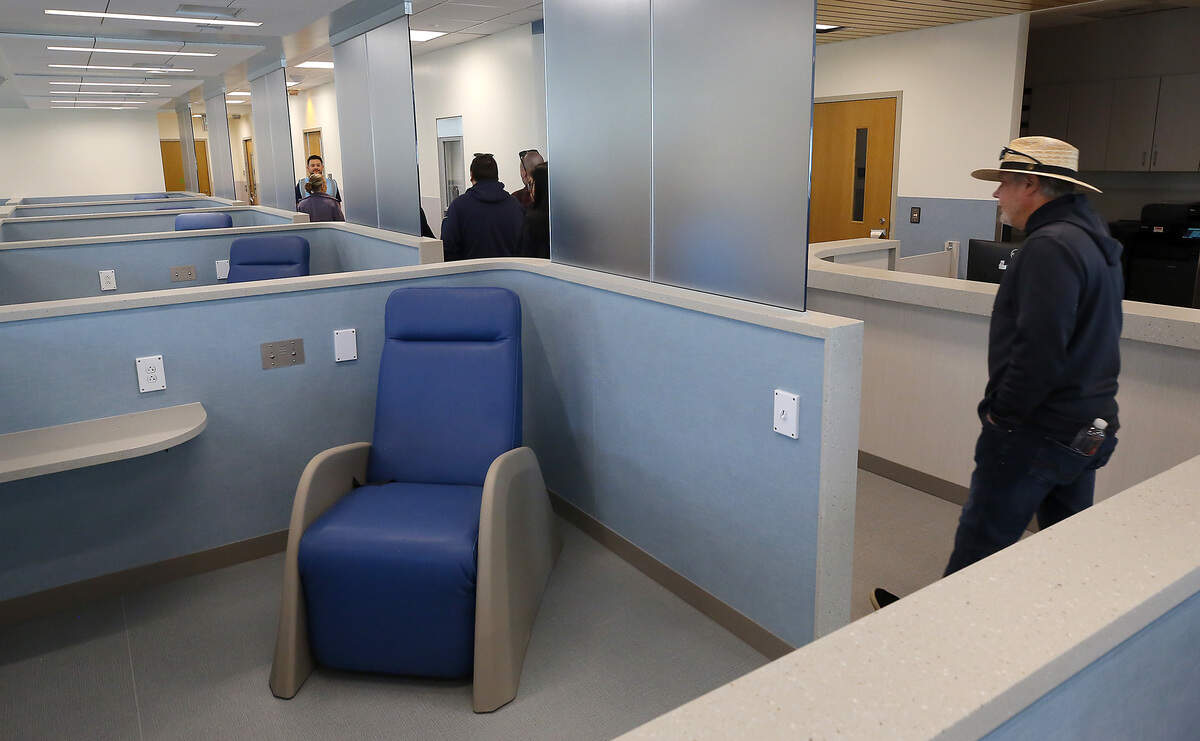 Community members take a tour through the Columbia Valley Center for Recovery in downtown Kennewick following Friday's grand opening and ribbon cutting ceremony.