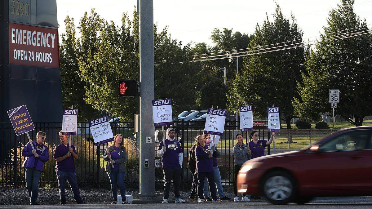 Striking technology and service employees at Kadlec Regional Medical Center start a seven-day strike Tuesday morning outside the freestanding emergency room off Highway 395 in Kennewick. The strike includes workers at both the Richland hospital. Kadlec officials say all facilities will remain open and all services continue through the strike.