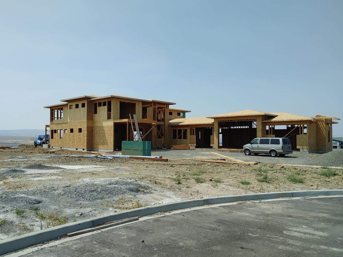 A 6,000-square-foot, two-story home under construction in July on the summit of Thompson Hill is the latest addition to the Kennewick skyline.