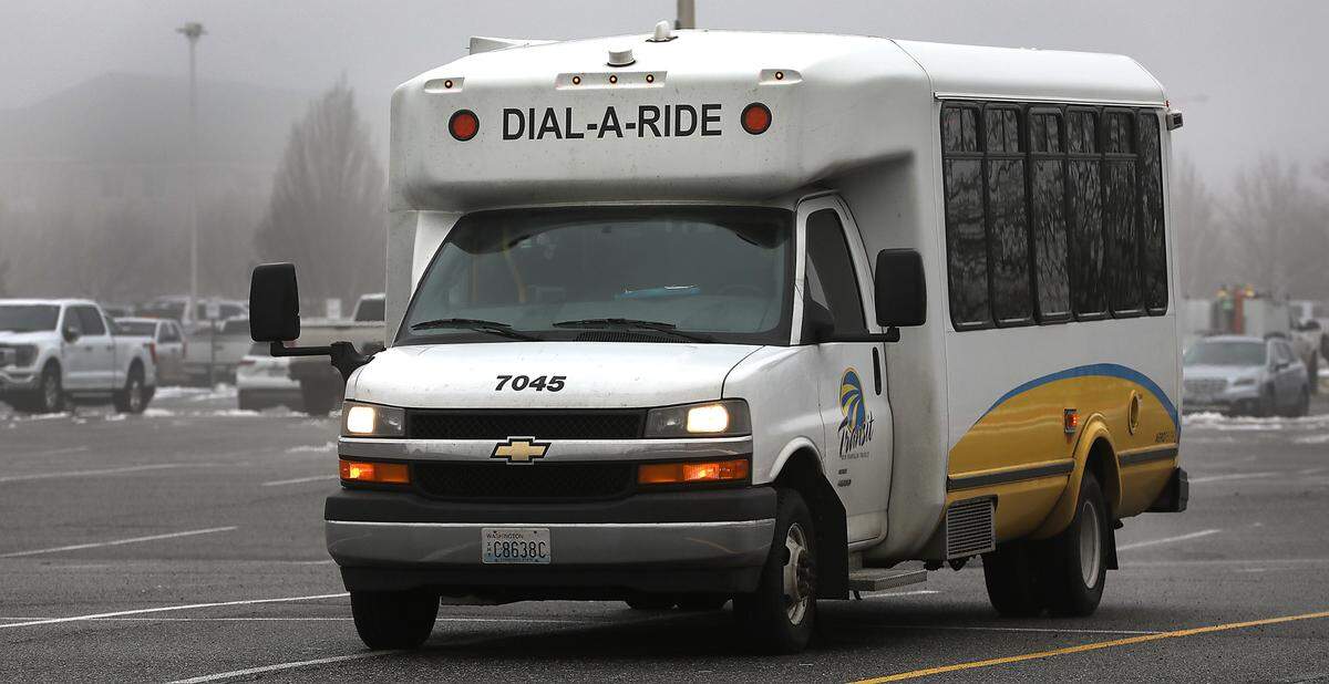 A Ben Franklin Transit Dial-A-Ride sits in the parking lot near the Toyota Center in Kennewick. 