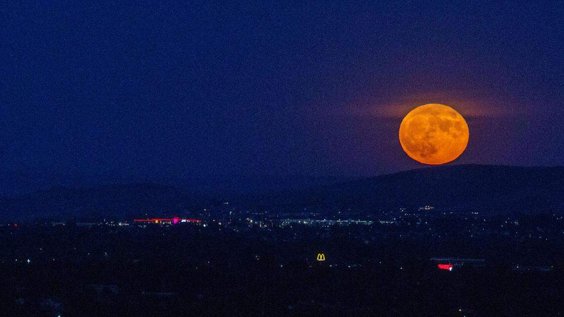 The “Strawberry Moon” rises over the Tri-Cities Thursday night. It’s the first full moon of summer and the last supermoon of 2021, according to Forbes.