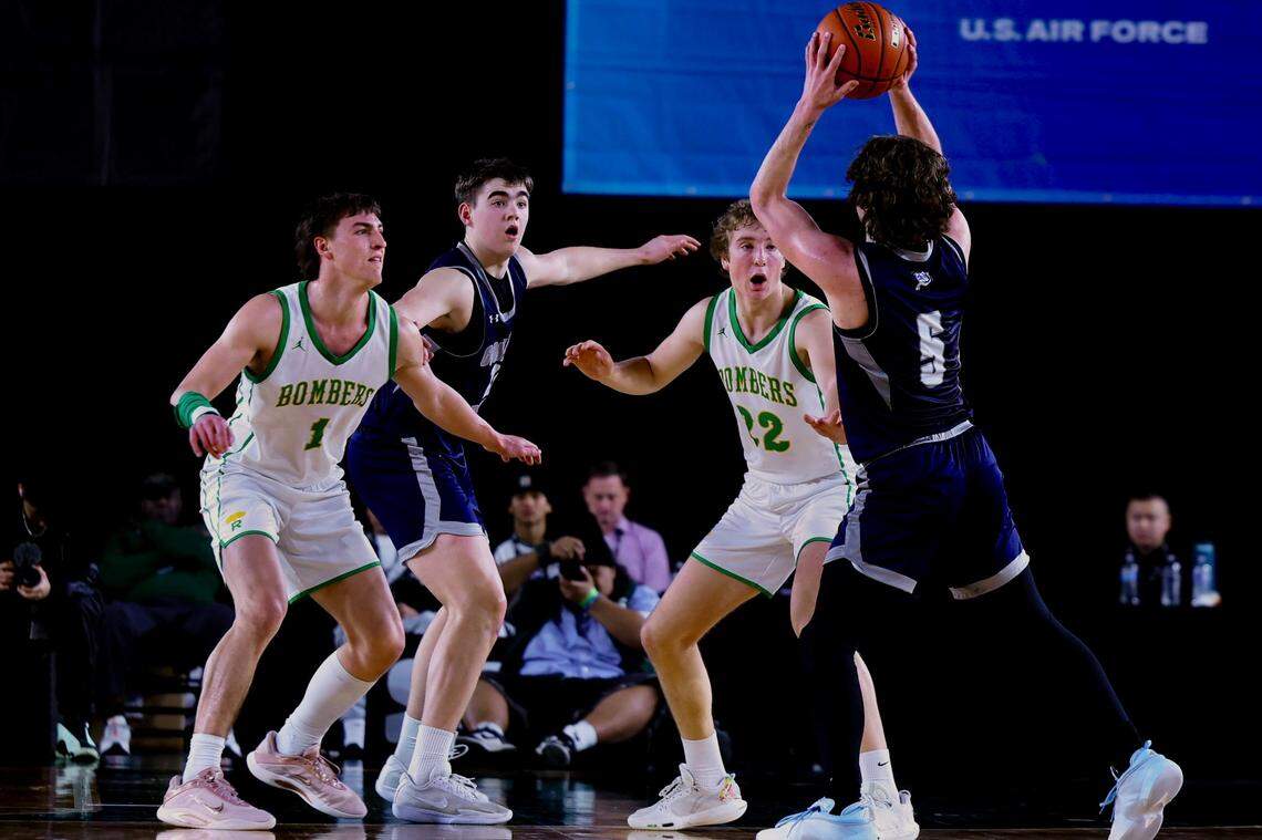 Richland’s Landen Northrop (1) and Jackson Woodard (22) defend against Gonzaga Prep during the WIAA Class 4A boys state championship game.