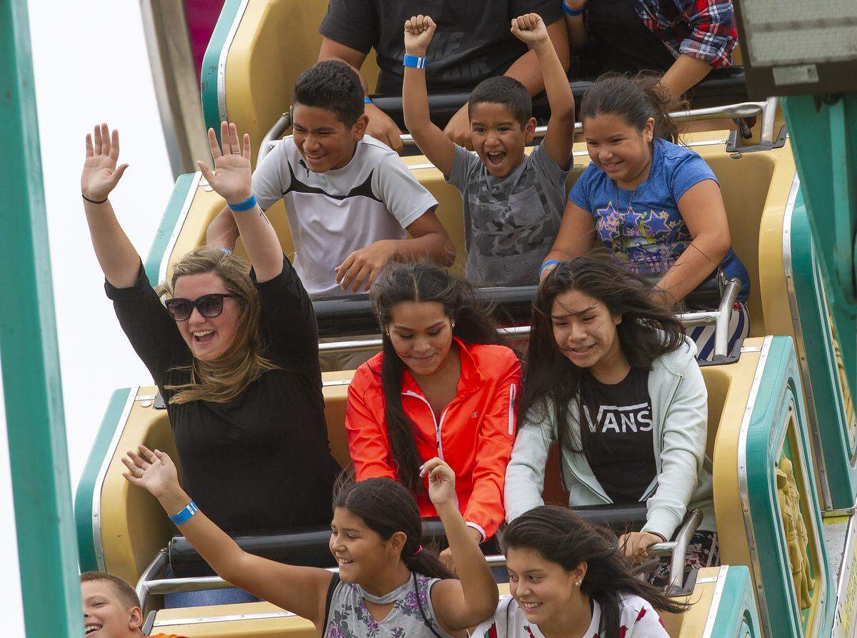 Fair-goers ride on the Pharaoh at the Benton Franklin Fair & Rodeo in Kennewick.