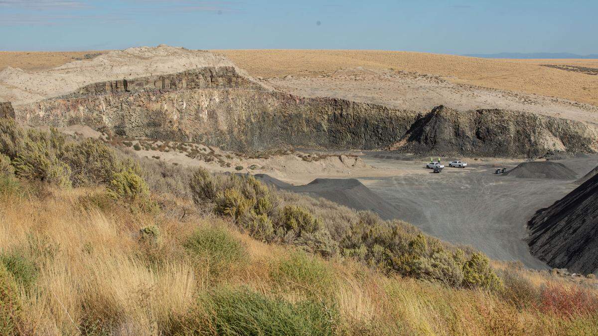 Benton County deputies are investigating the death of a person in a car at the bottom of a cliff south of Kennewick.