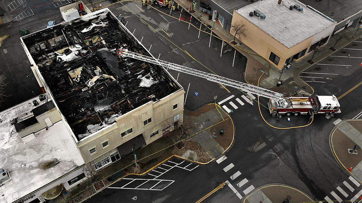 An early two-alarm fire heavily damaged the top floor of a historic downtown building at the corner of Kennewick Avenue and Cascade Street.