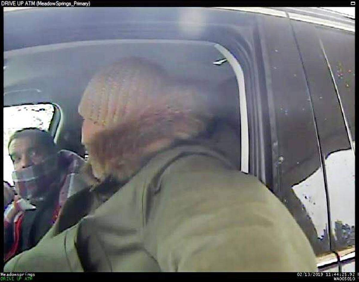 Pasco police are looking for the passenger who sat in a Kia Sorrento while a man tried to use stolen debit card numbers at banks.