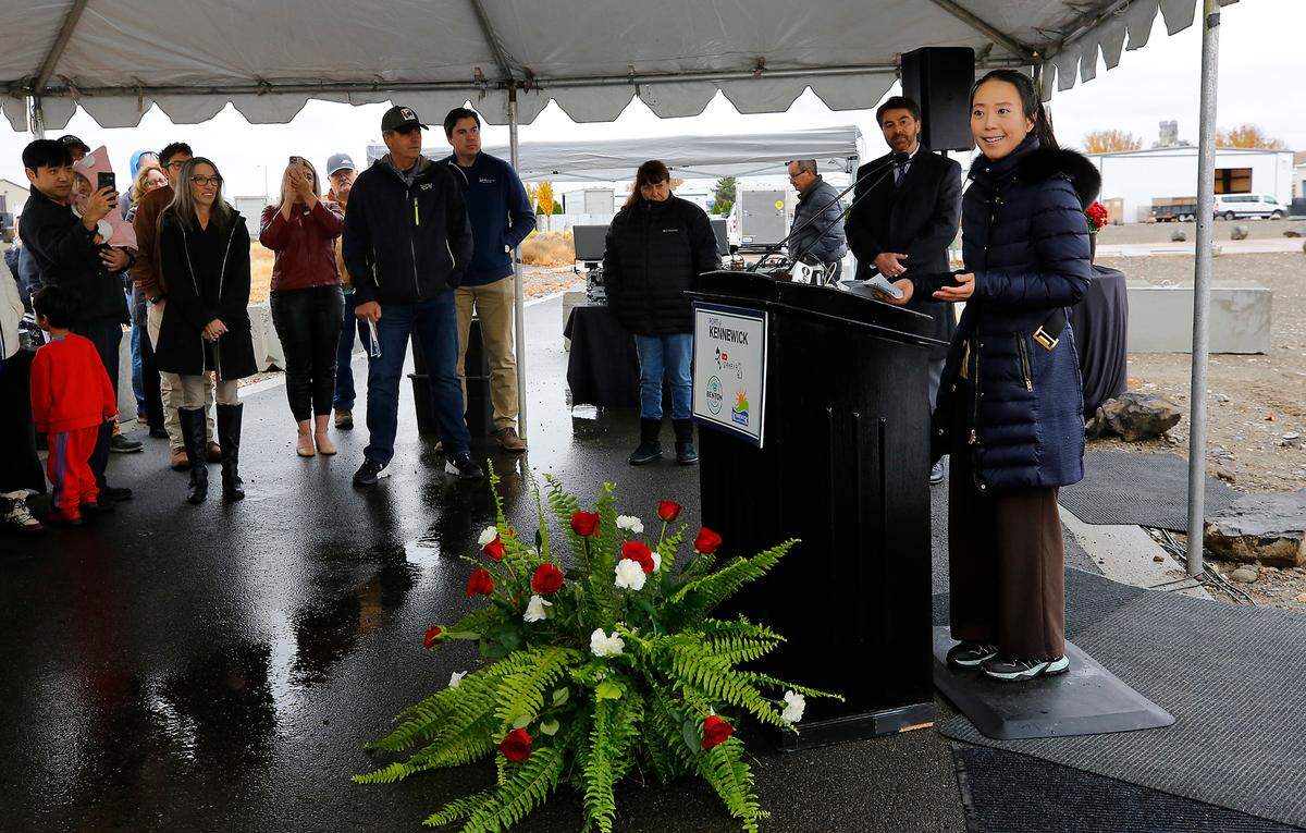 Isabelle yuri Na, owner/developer of KUKI Izakaya restaurant, speaks during Friday’s groundbreaking ceremony for the first private-sector business to begin construction at Vista Field in Kennewick.