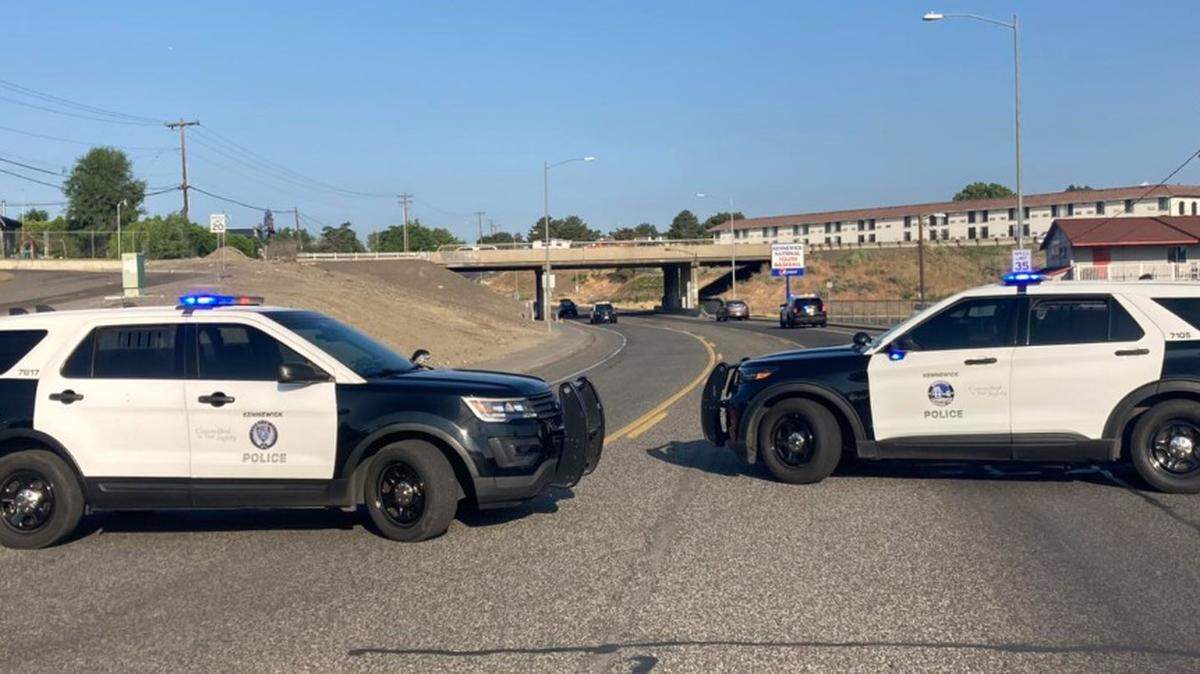 Kennewick police closed part of Fourth Avenue near Highway 395 Saturday morning as they investigated the hit and run death of a man found beside a bicycle.