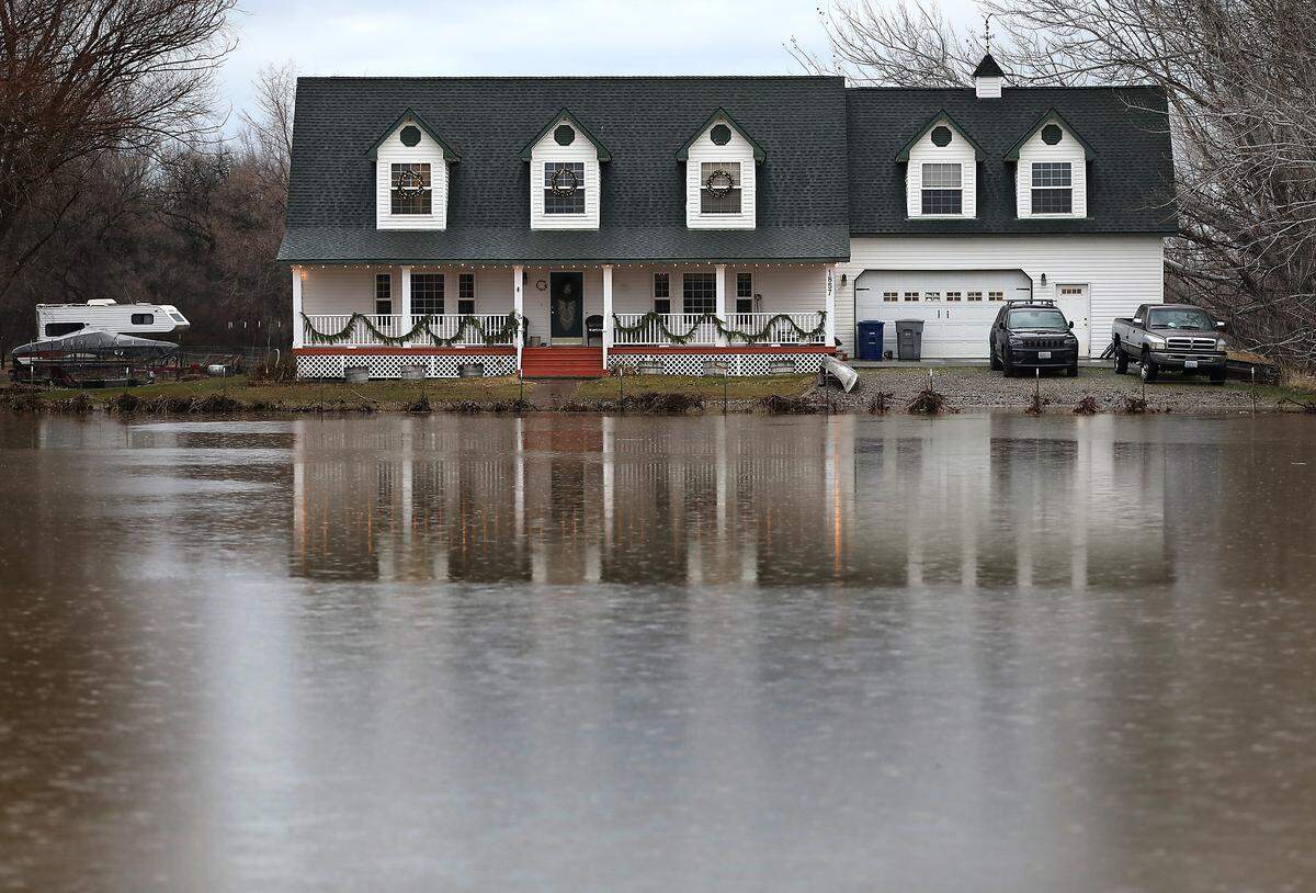 A home and vehicles at 1857 Kingston Road in Richland appeared to have escaped damage from Yakima River floodwaters after cresting over the weekend. The house is situated on high ground in the area near the river.