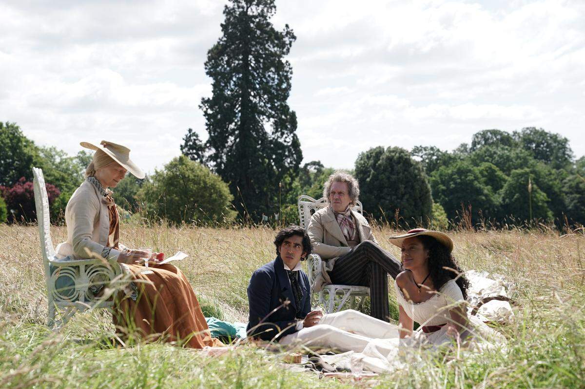Tilda Swinton, Dev Patel, Hugh Laurie and Rosalind Eleazar in “The Personal History of David Copperfield.”