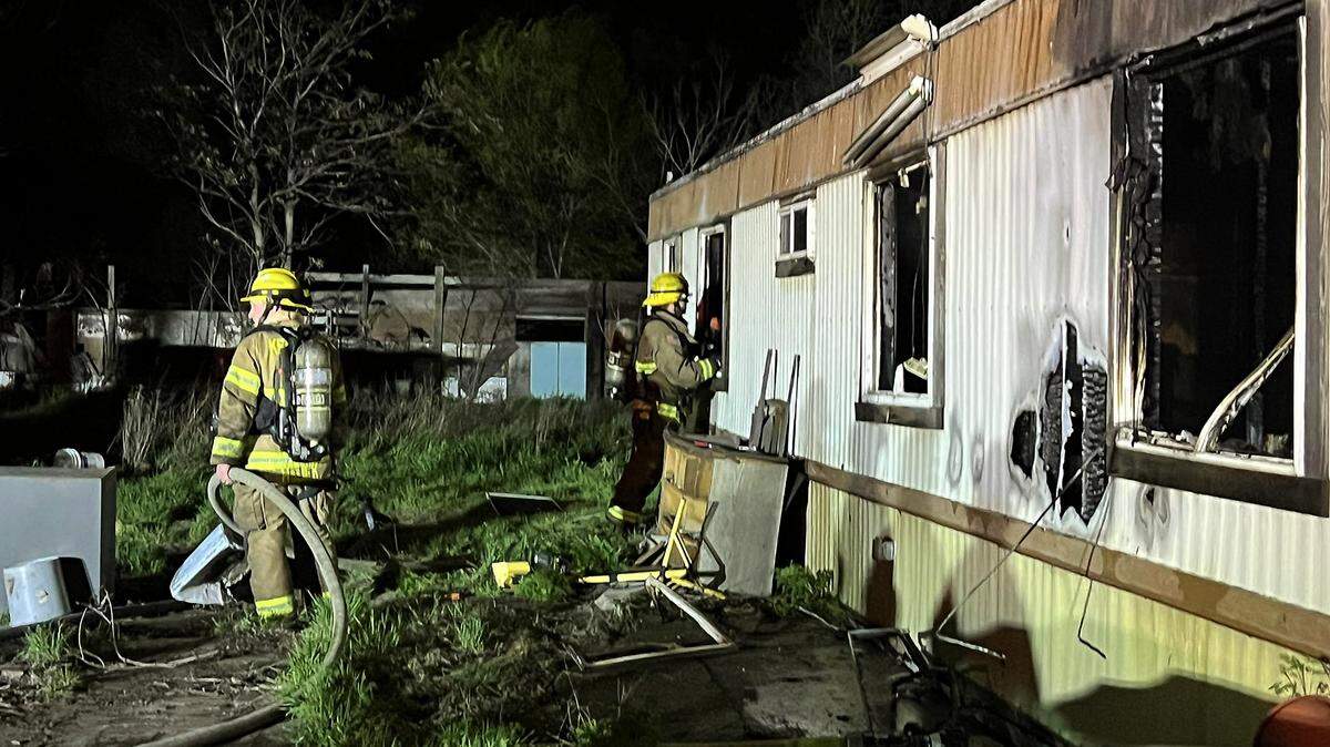  Firefighters from Benton County Fire District 1 and the Kennewick Fire Department extinguish a fire in  Finley. 