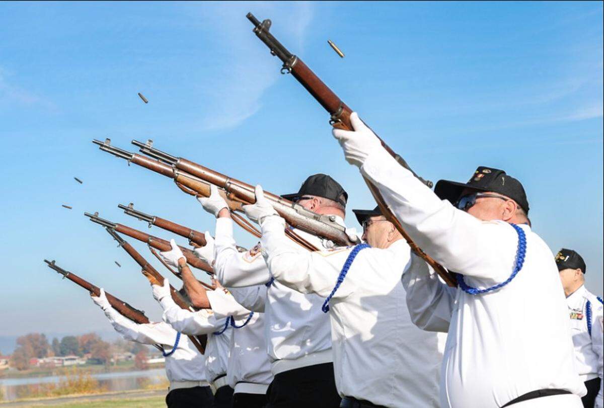 Members of Kennewick VFW Post 5785 fire the 21-gun salute to honor all who have served during the 2025 Veterans Day ceremony at Columbia Park in Kennewick.