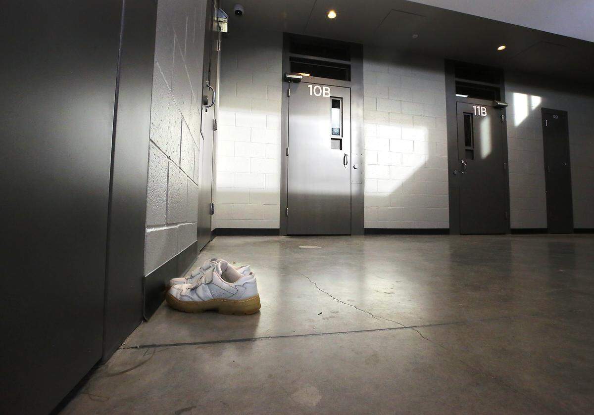 A pair of shoes sits on the floor in a new living area for offenders at the Benton County Juvenile Justice Center. 