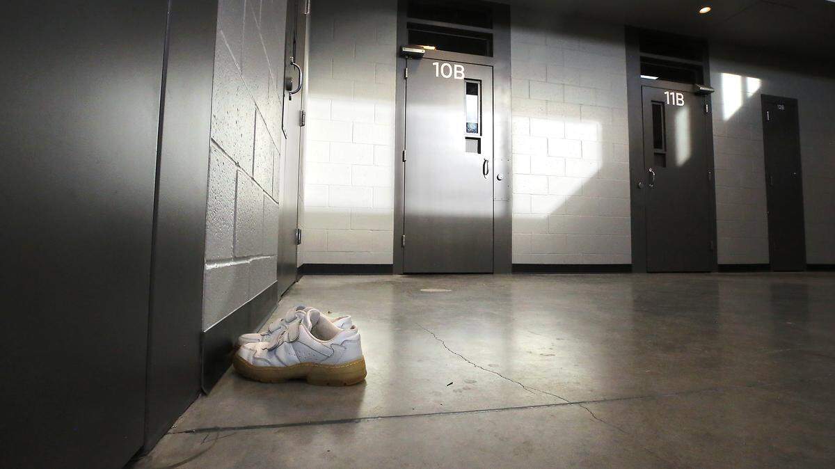 A pair of shoes sits on the floor in a new living area for offenders at the Benton County Juvenile Justice Center. 