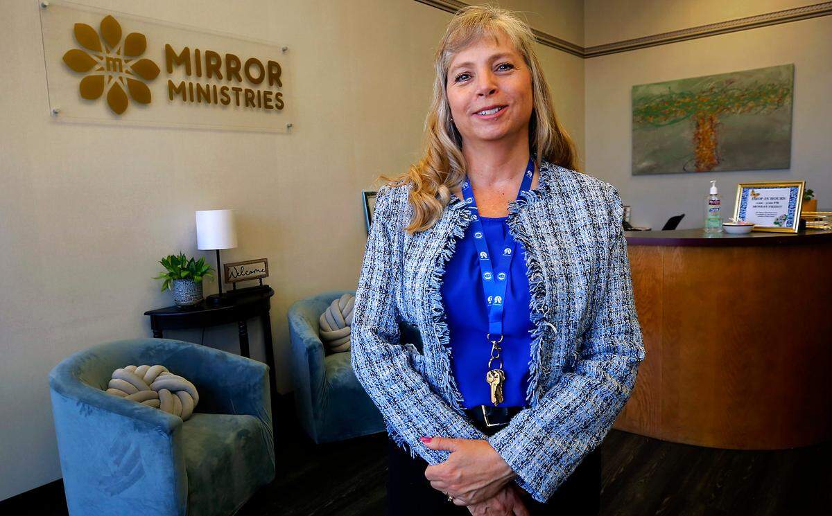 Tricia MacFarlan, executive director of Mirror Ministries, stands in the Christian nonprofit’s new Kennewick office space.