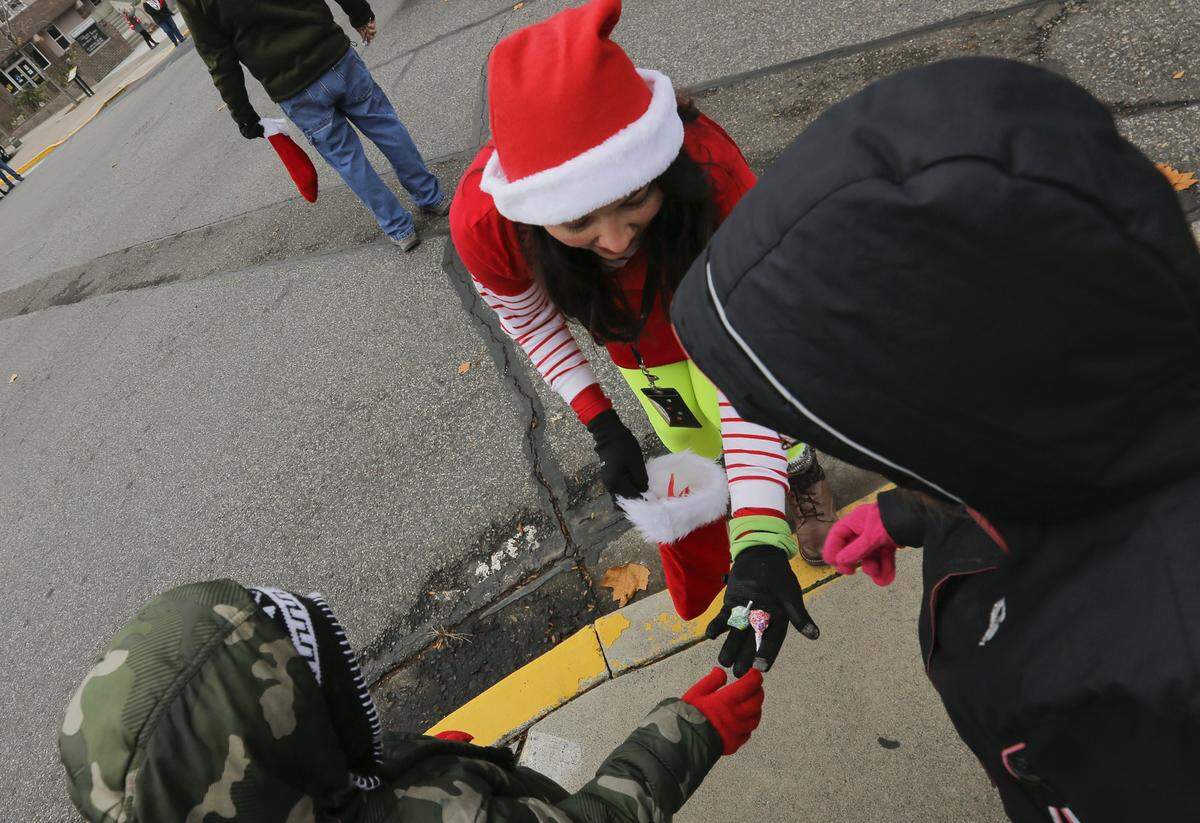 Scenes from last year’s Christmas parade in downtown Kennewick.