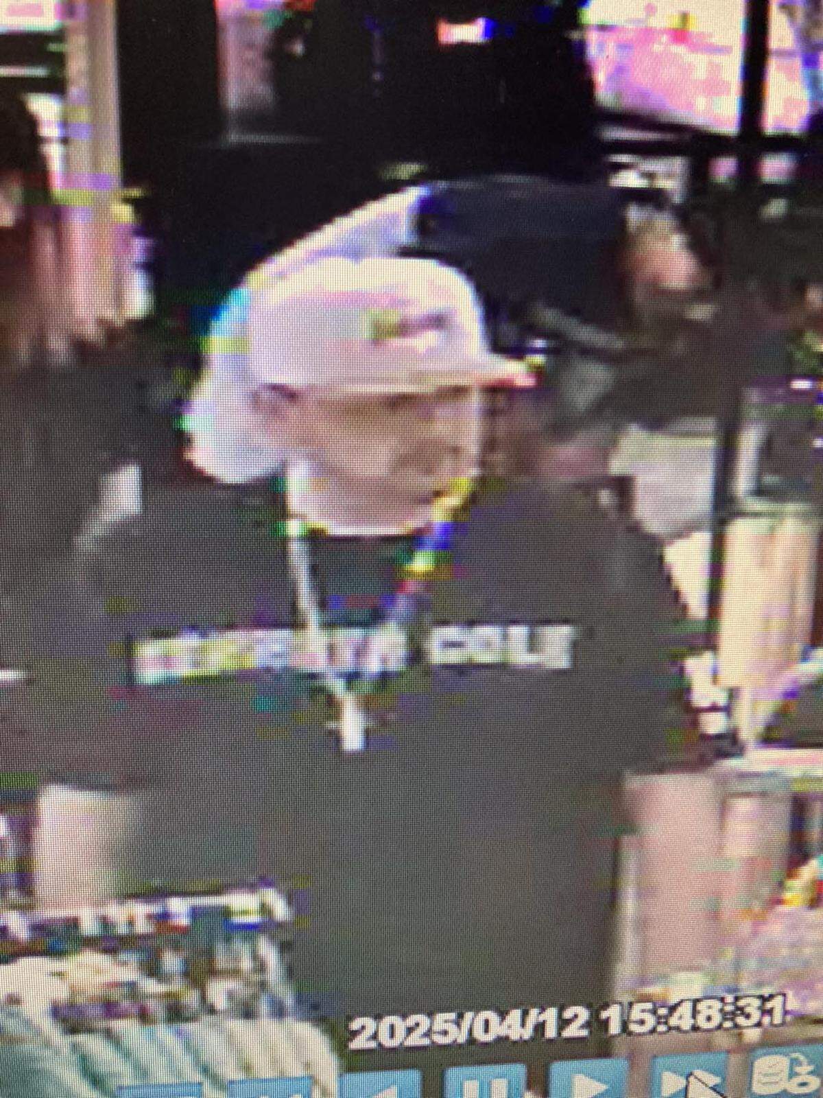 Kennewick police are looking for a man who allegedly directed to juveniles to load items into a cart before the kids ran out with the items.