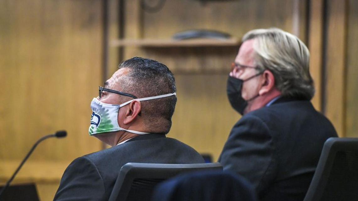 Richard Aguirre, left, sits with attorney John Henry Browne in Spokane County Superior Court during his murder trial. A mistrial was declared Thursday.