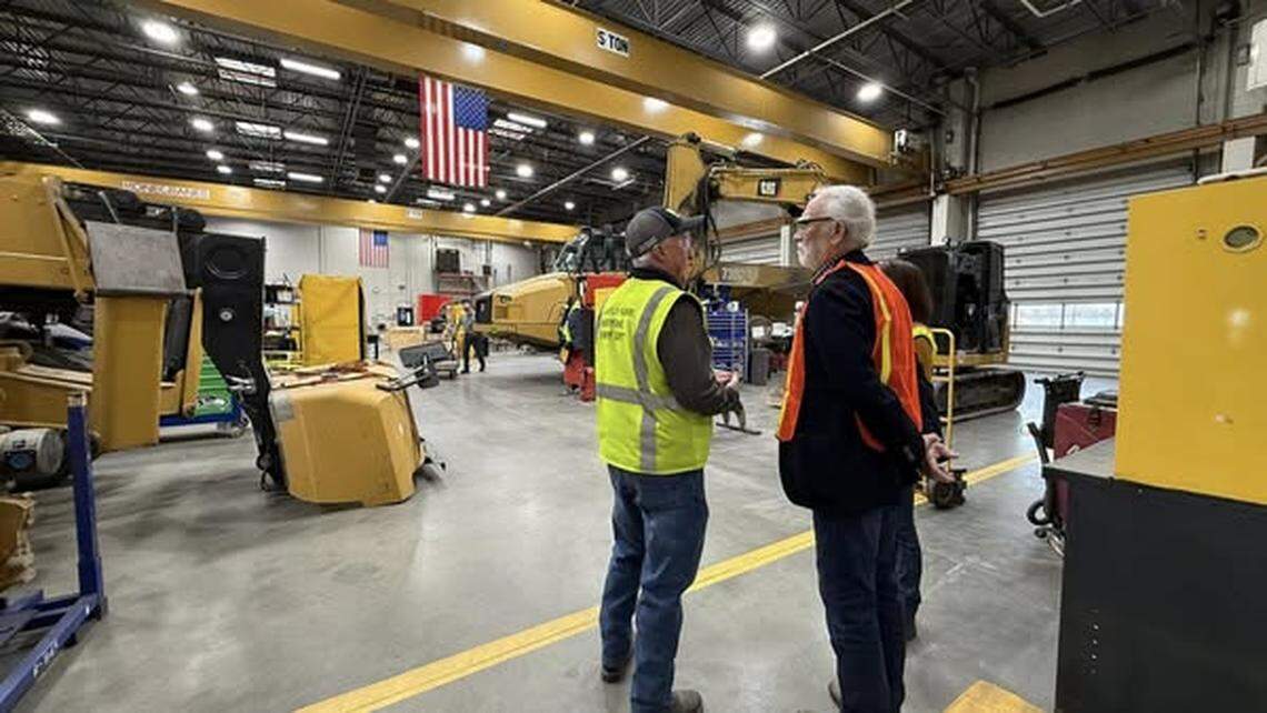 Rep. Dan Newhouse, R-Wash., right, toured Western States Cat in Pasco Thursday and heard about how it supports farmers in the 4th Congressional District.