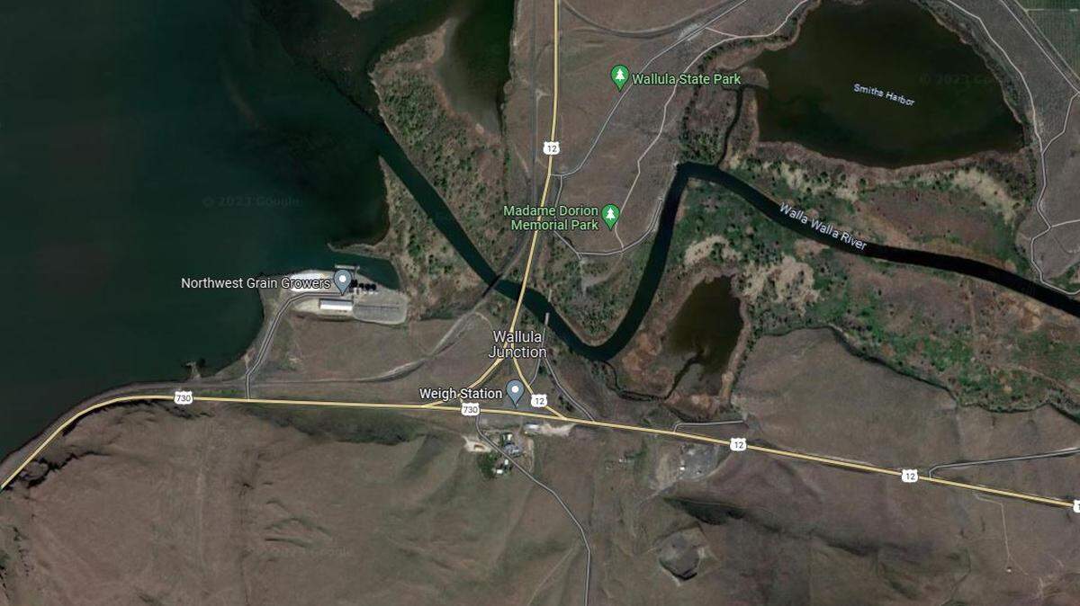 Highway 12 is closed as a fire burns on both sides of the highway in the area.