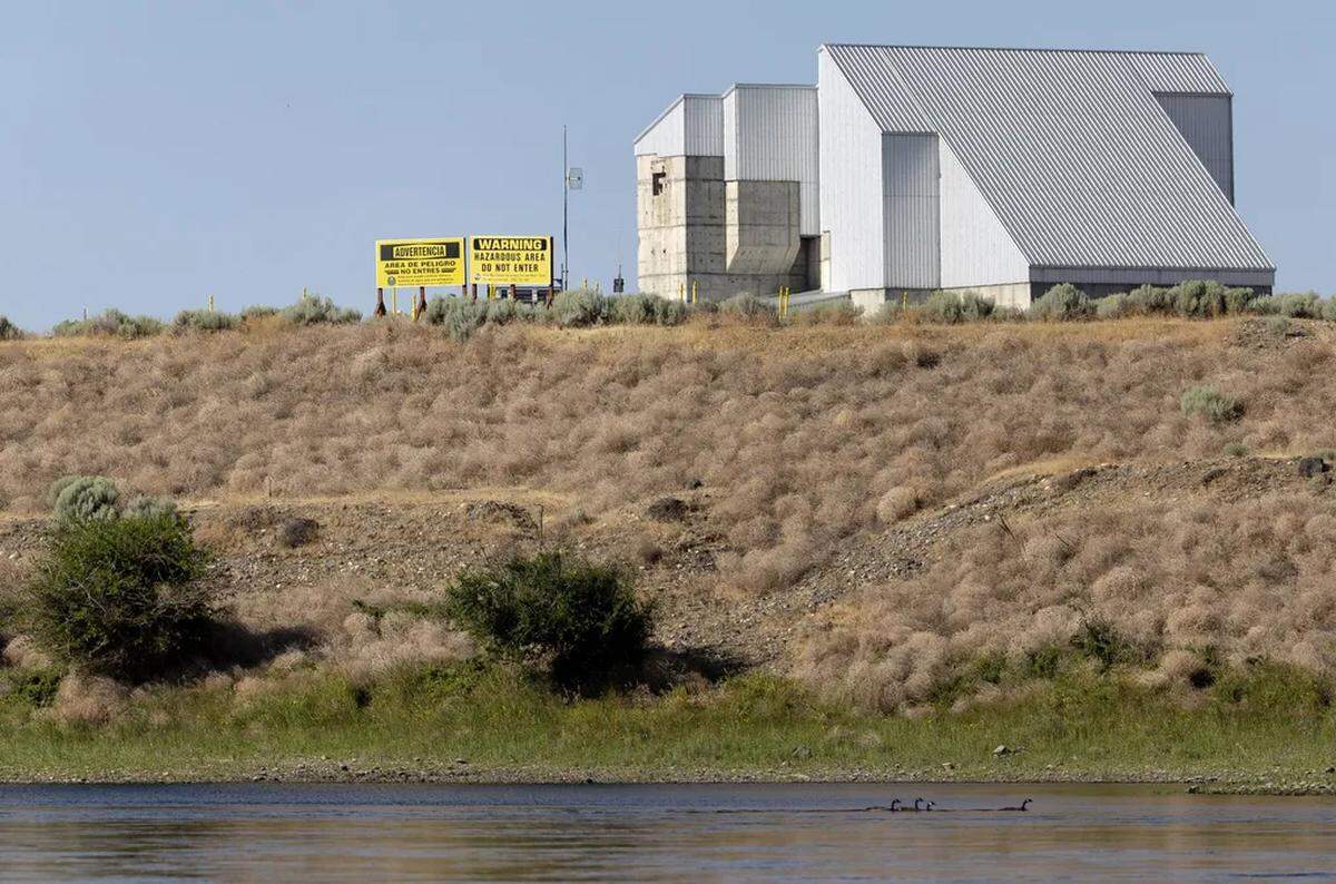 Warning signs mark a hazardous area of the Hanford Site nuclear production facility on July 9.