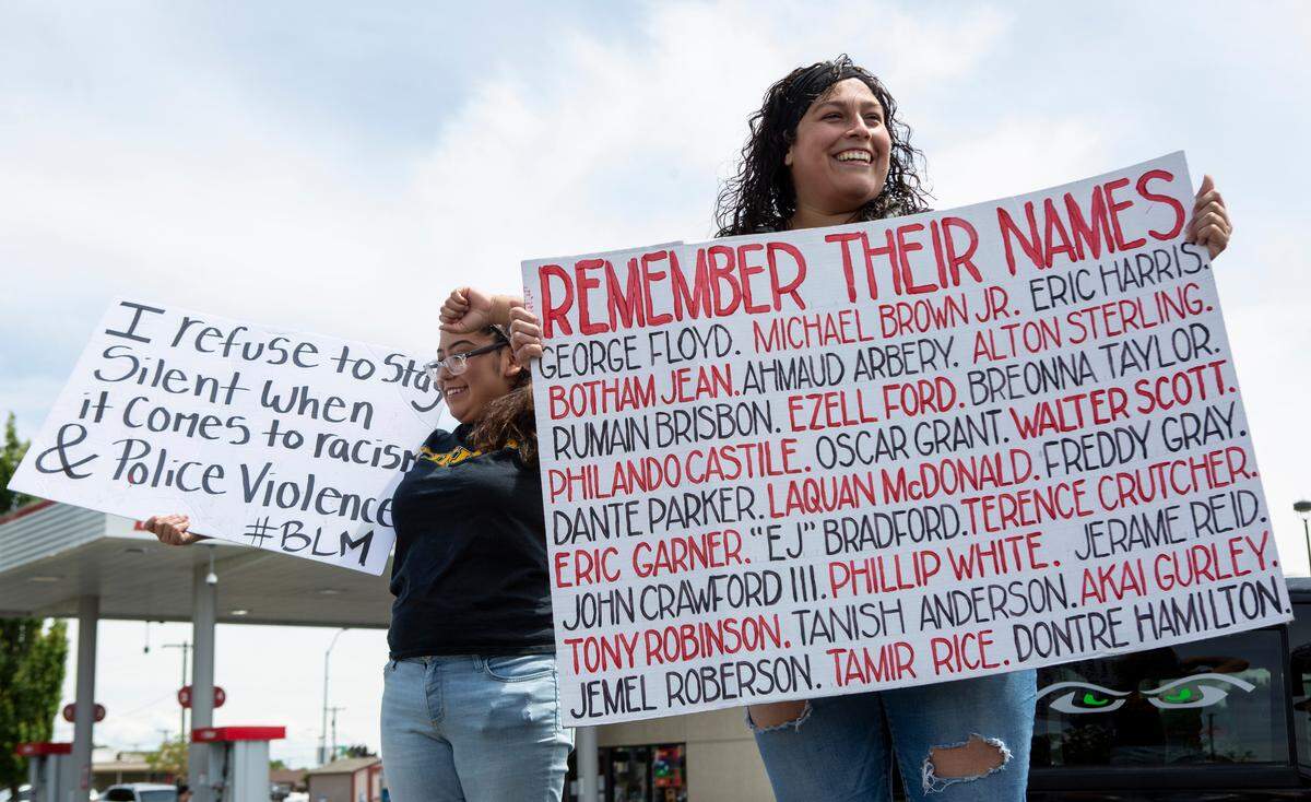 Olivia Bautista, 29, on right, and Brenda Lopez, 18, left, joined other demonstrators in Pasco to show their support for the Black Lives Matter movement. Bautista, who has a degree in criminal justice, says the movement has given her a new perspective. “I was always on the side of believing cops were just doing their job but recent events are showing that that’s not the case and hasn’t been for a while,” she said.