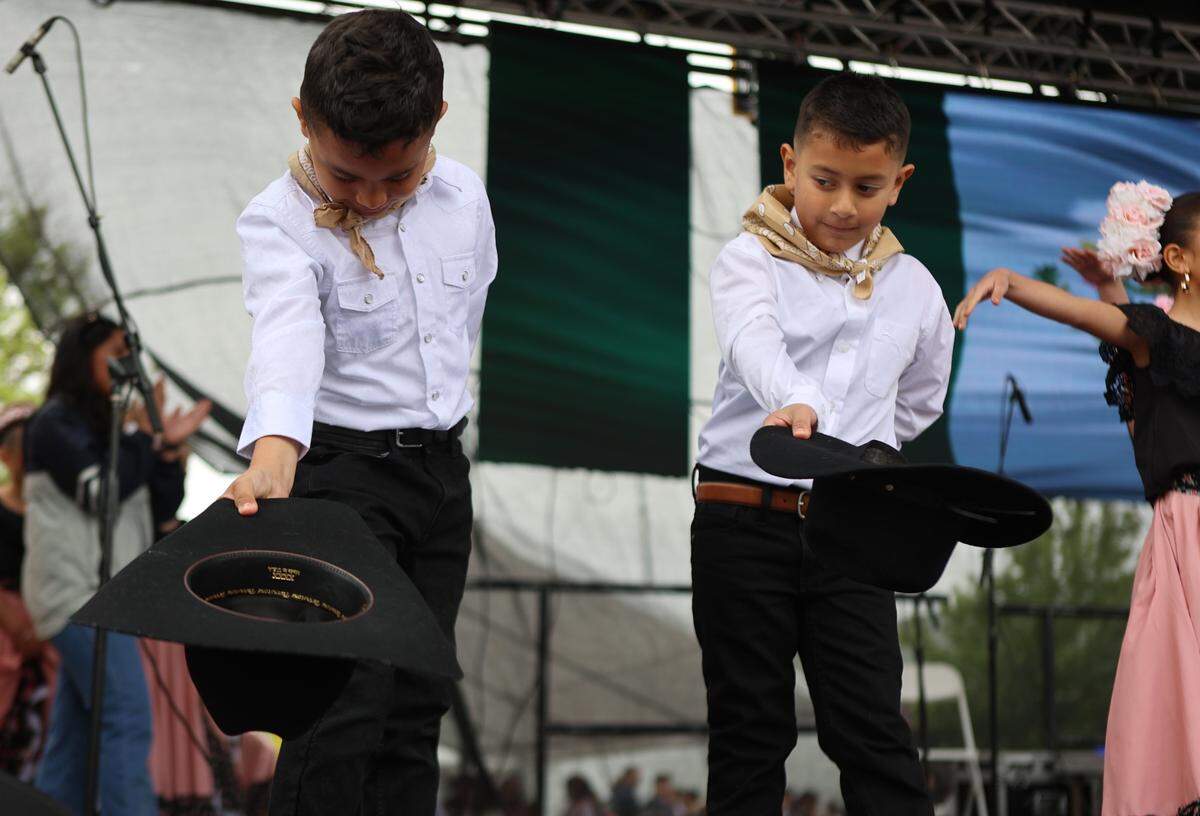 Two male dancers perform at Pasco’s Cinco de Mayo on Saturday, May 4.