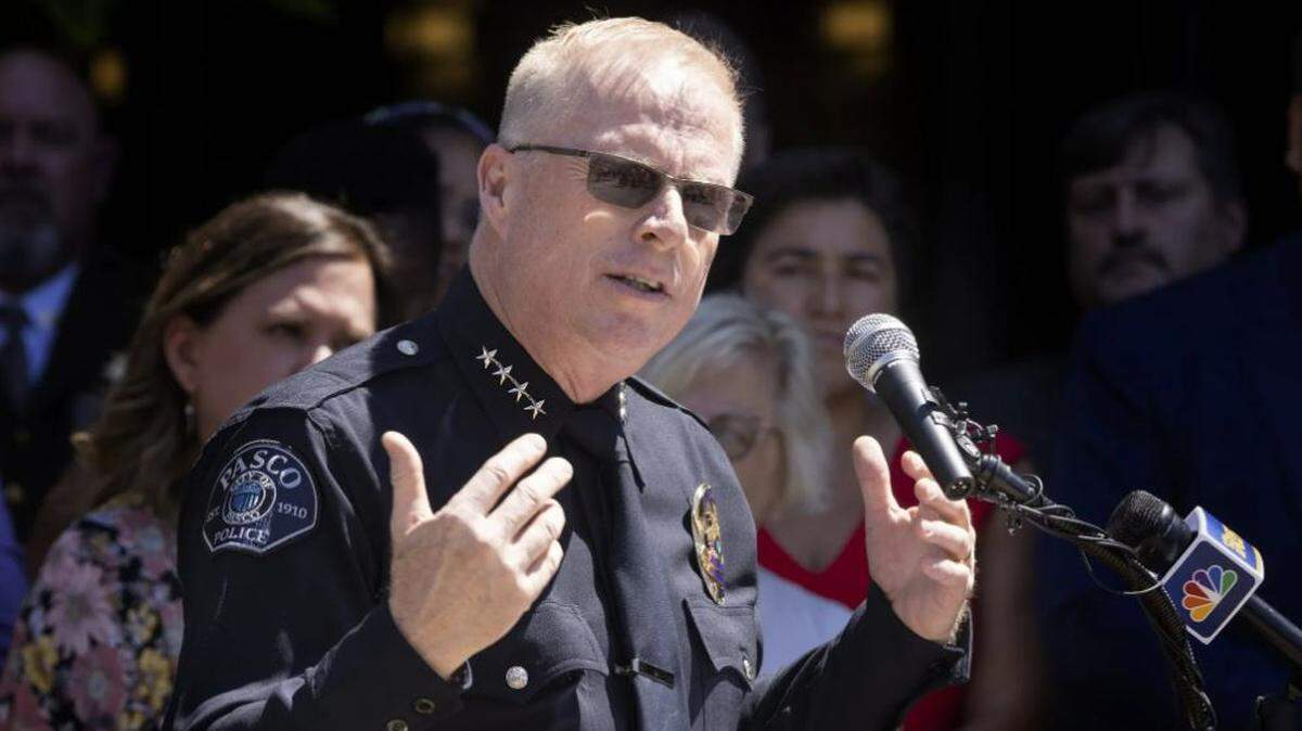 Pasco Police Chief Ken Roske speaks at a news conference with Washington Gov. Jay Inslee and others on a proposal to expand the Criminal Justice Training Commission academy.