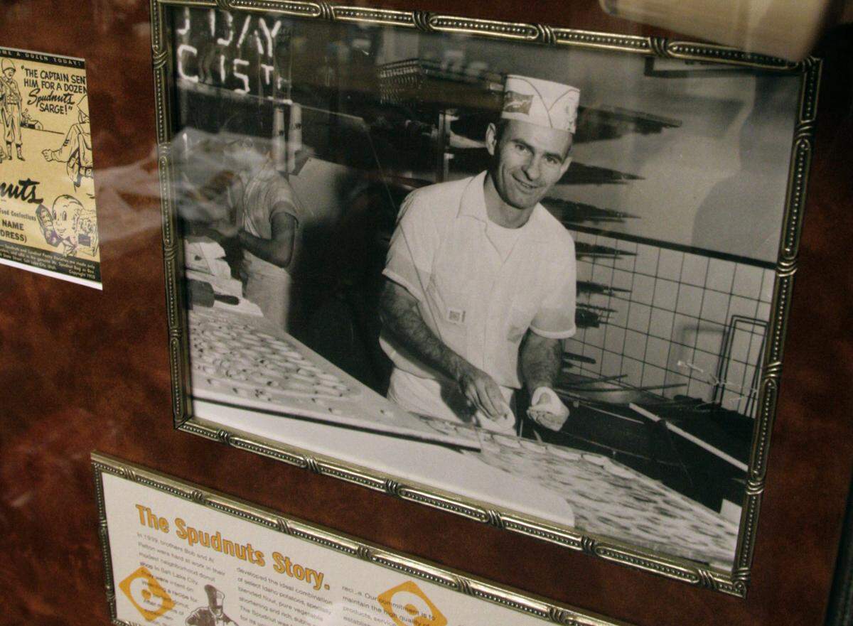 Spudnut Shop in Richland decor shows the family history, including this picture of co-founder Barlow Ghirardo, behind this Richland institution.