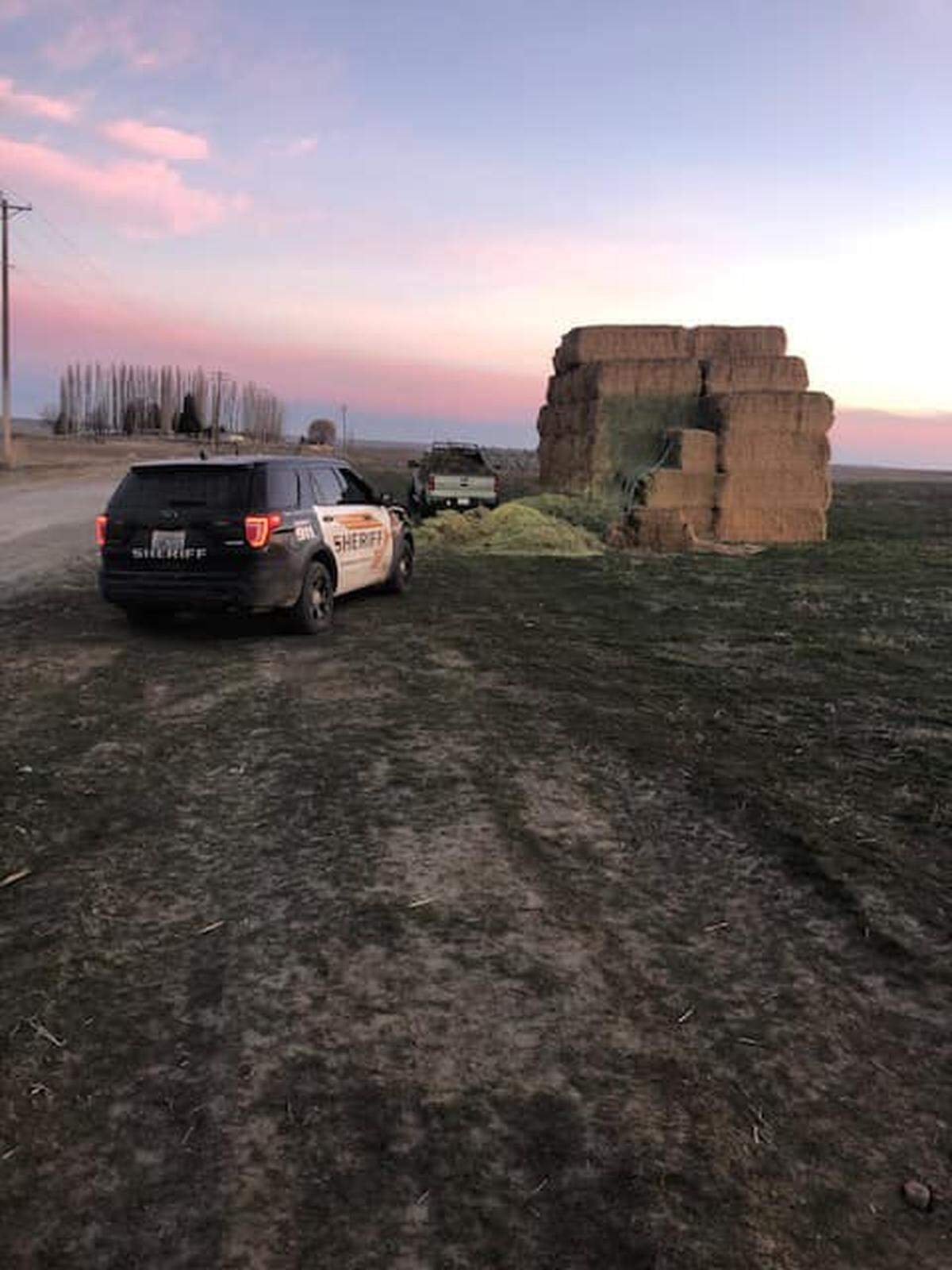 A man got caught under a 1,500-pound bale of hay as he tried taking it from a Franklin County farm Monday.