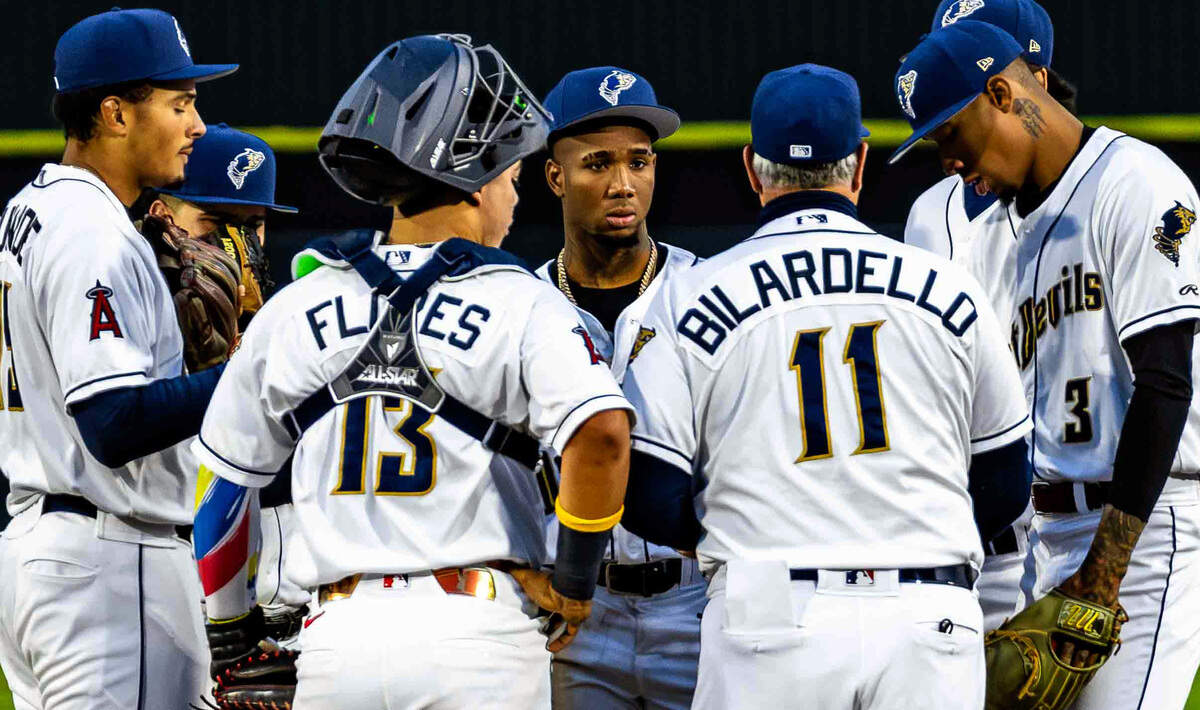 Tri-City Dust Devils manager Dann Bilardello meets with players during a game earlier this season at Gesa Stadium in Pasco. Bilardello guided the Dust Devils to a franchise-record 61 wins in 2025 and has the club back in Northwest League contention this season as Tri-City carries an eight-game winning streak into a six-game road series at Hillsboro.