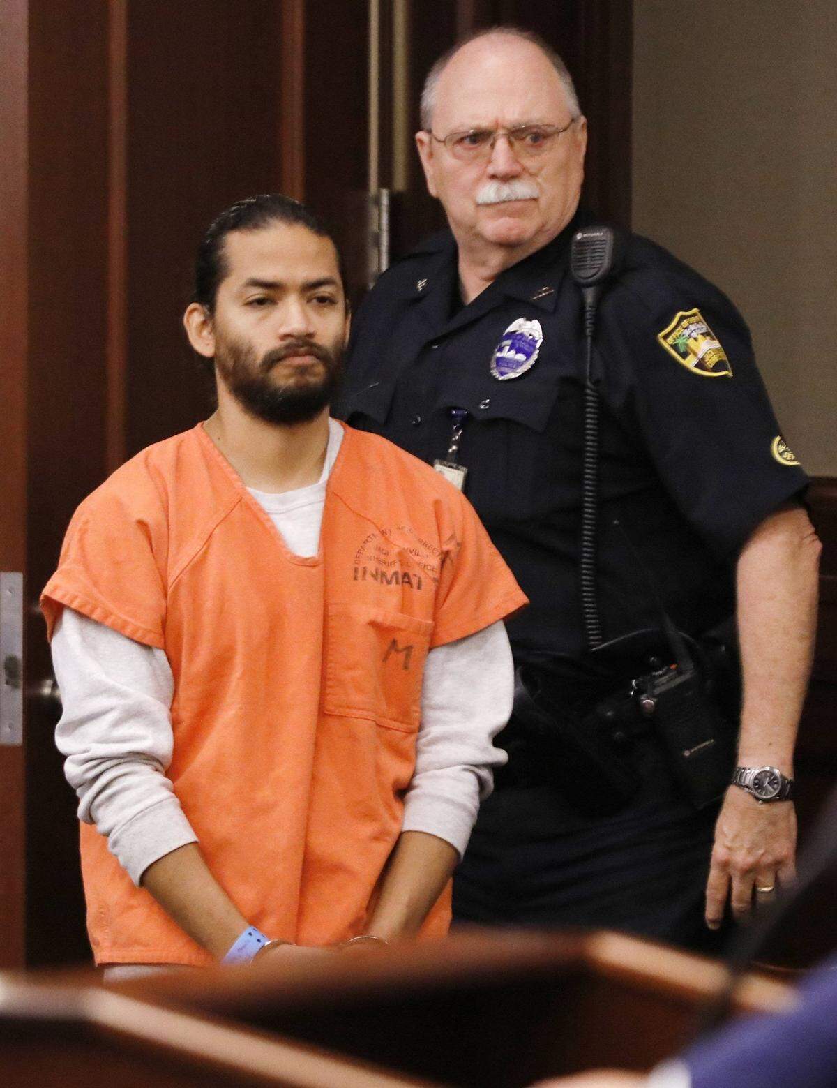 Mario Fernandez Saldana is led into a Duval County courtroom for his arraignment Tuesday, April 4, 2023. He pleaded not guilty to first-degree murder, conspiracy to commit murder, solicitation to commit a capital felony and child abuse in the Jared Bridegan murder case in Jacksonville Beach. Jki 040423 Fernandez Saldana Arraign