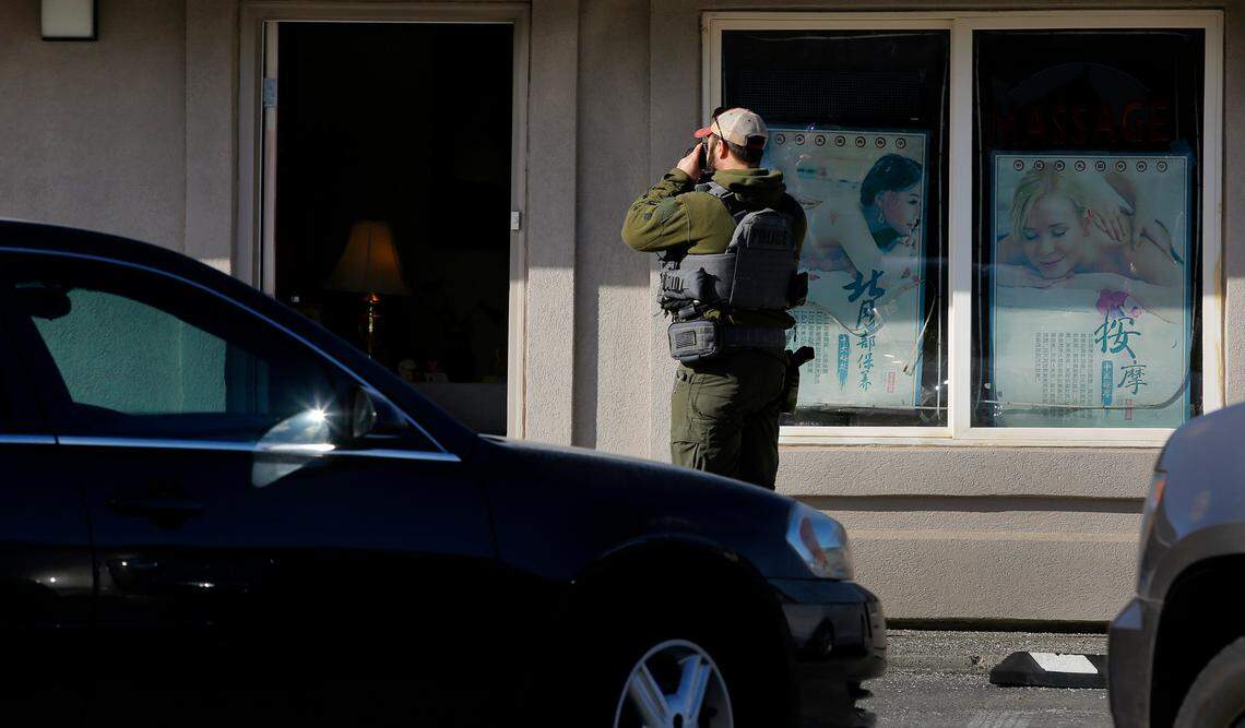 Kennewick police help federal agents search a massage business at 6201 West Clearwater Ave., Kennewick in March 2023.