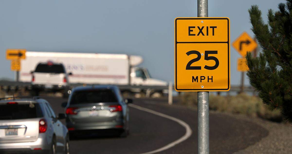 The on-ramp from Columbia Drive in Kennewick to Highway 395 near the blue bridge has recommended speed of 25 mph  because of the 90-degree turn to enter the merging lane. Yellow highway signs in Washington state indicate the recommended speed for the ramp drivers are about to enter.