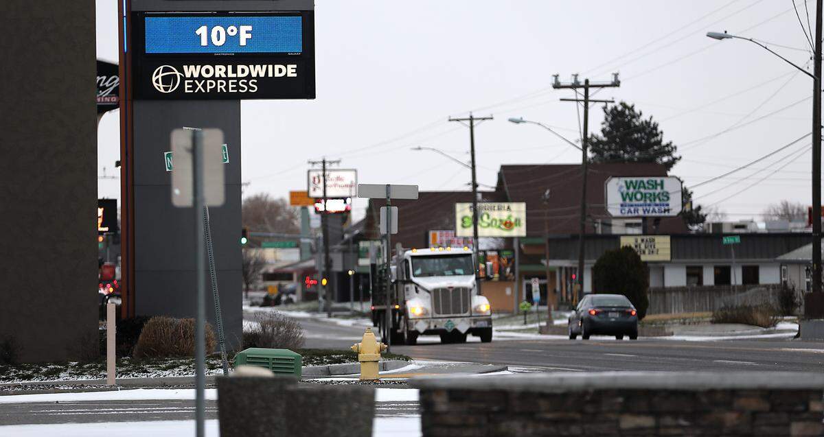An outdoor temperature of 10 degrees is displayed early Friday morning on this electronic sign on a bank building on West Clearwater Avenue in Kennewick. The temperature in the Tri-Cities is forecast to drop to 2 degrees Friday night and lows should remain in the single digits to 10 degrees through Monday night.