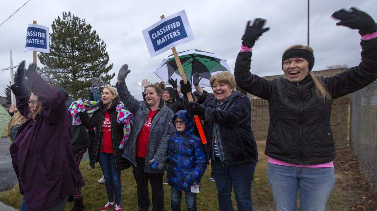 Kennewick paraeducators and supporters rally near the school district office last week.
