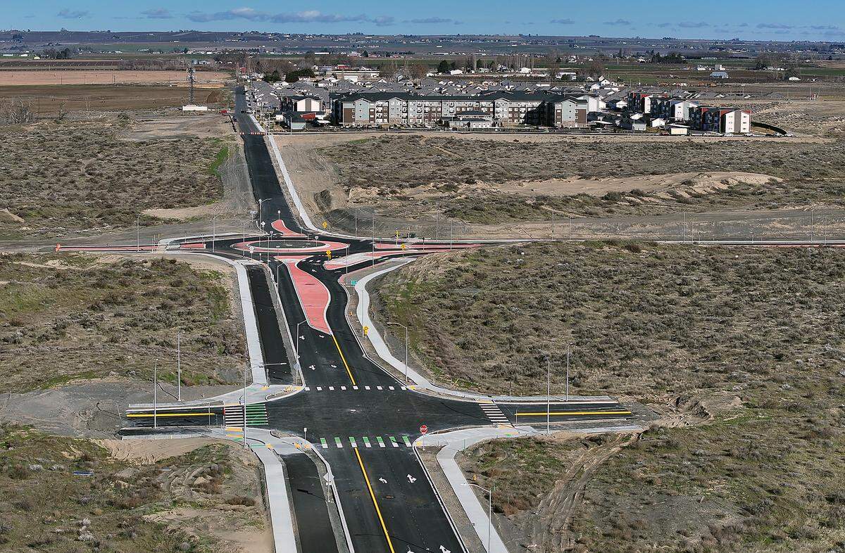 The recently paved section of Road 108 in west Pasco connects to Burns Road near the Affinity at Broadmoor and The Goat at Broadmoor apartment complexes. Sandifur Parkway connects into the roadway at the roundabout.