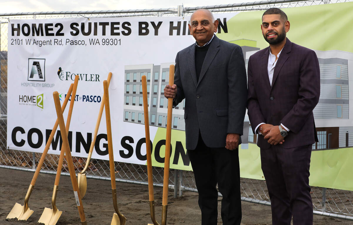 A-1 Hospitality, led by president Vijay Patel, left, and son, Taran Patel, managing principal, at the November 2024 groundbreaking ceremonies for the now-open Home2 Suites by Hilton.