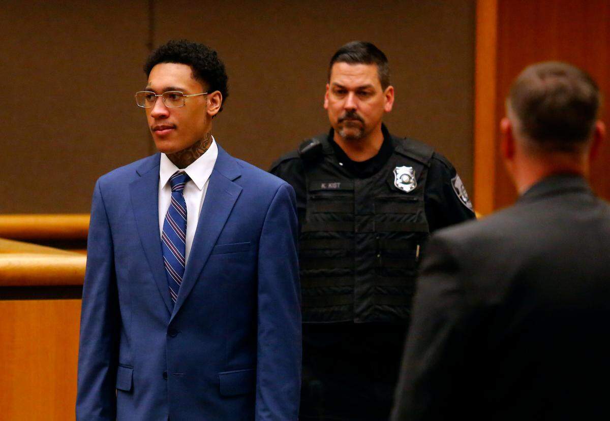 Lawrence Isaiah Groce is brought into a courtroom by a corrections officer at the Benton County Justice Center in Kennewick during his April 2023 murder trial.